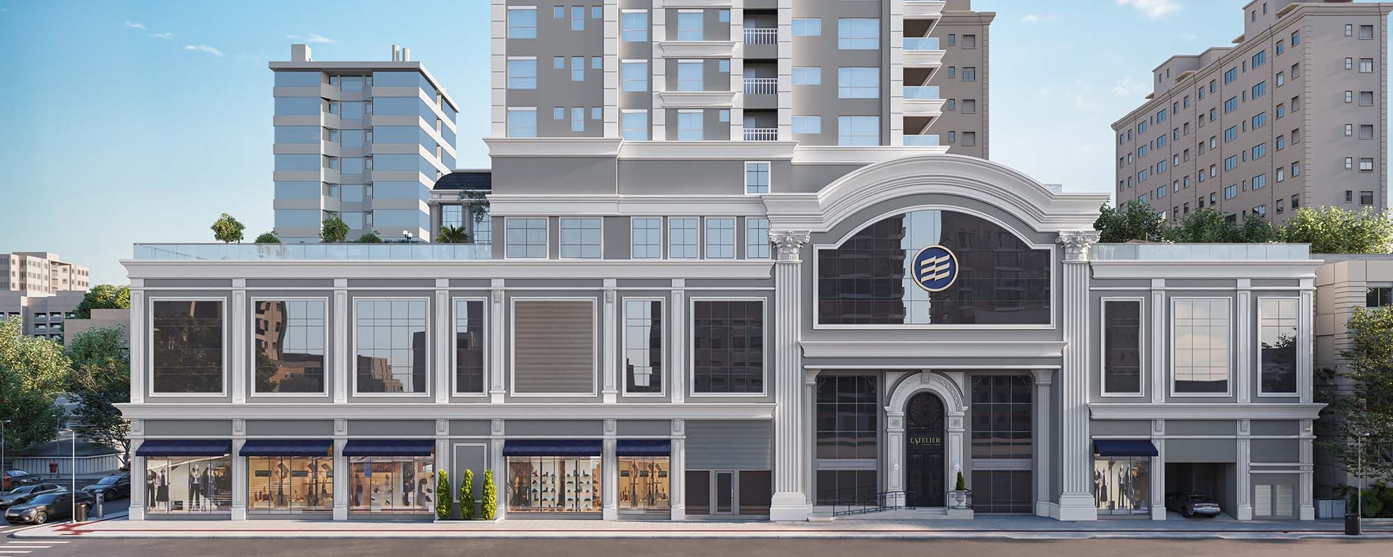 Fachada e embasamento do L'Atelier Concept Homes, com fachadas comerciais na base da torre