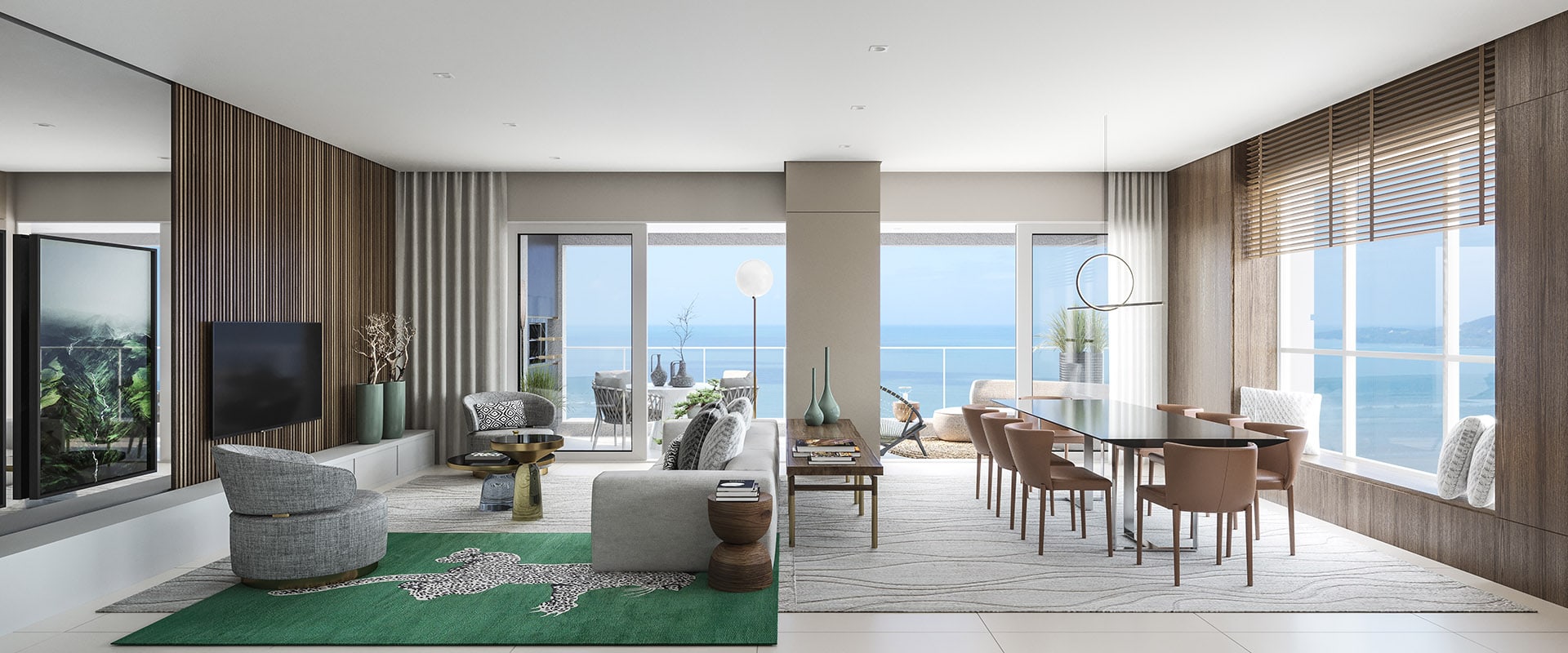 Living integrado de apartamento do L'Atelier Concept Homes, com vista para o mar
